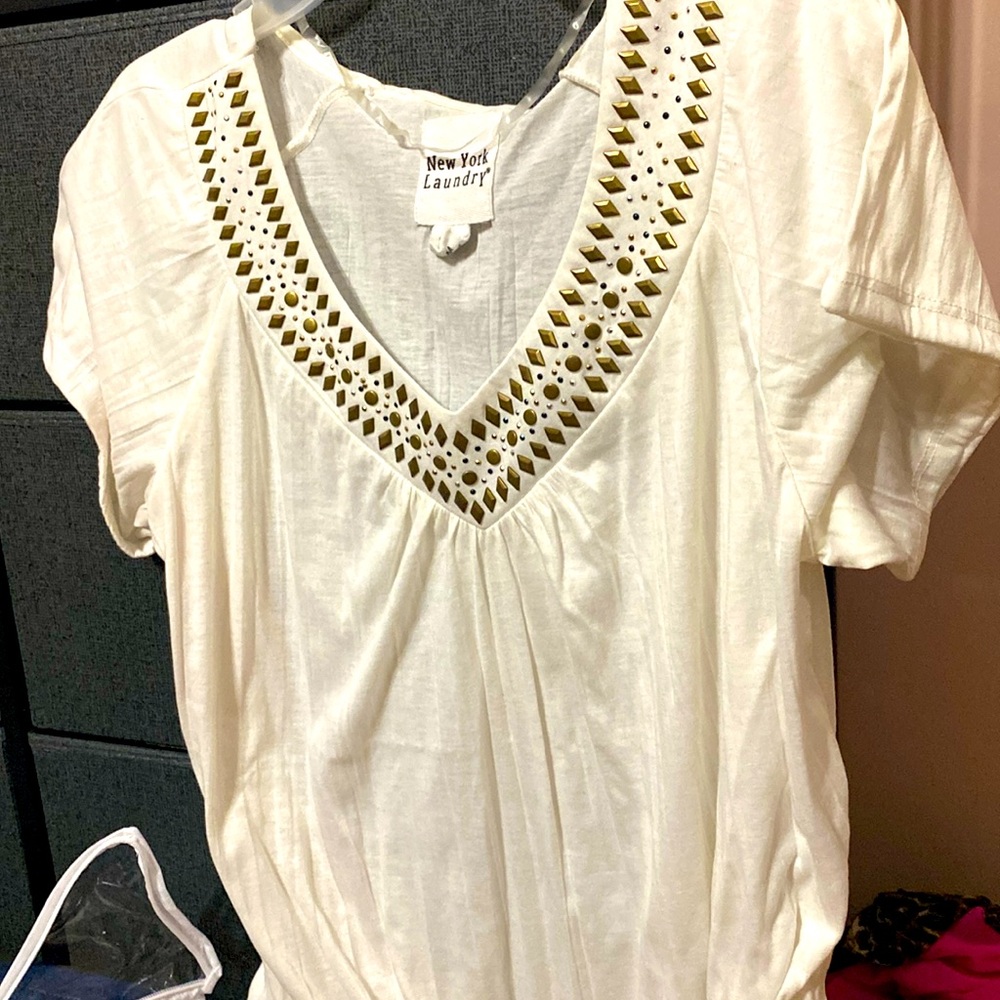 Very cute top. Size medium white/cream with gold and blue silver diamonds.